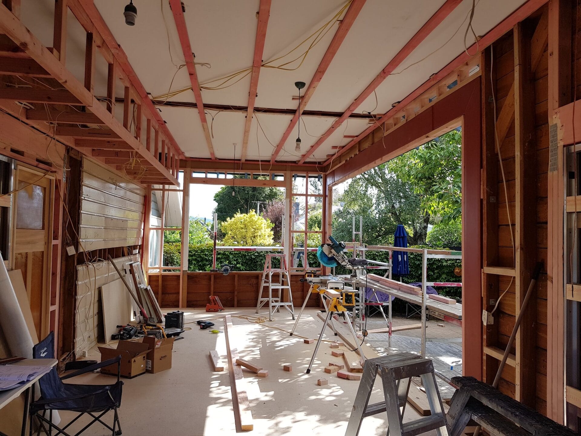 Darling — mid-renovation, structural framing during the kitchen and dining transformation