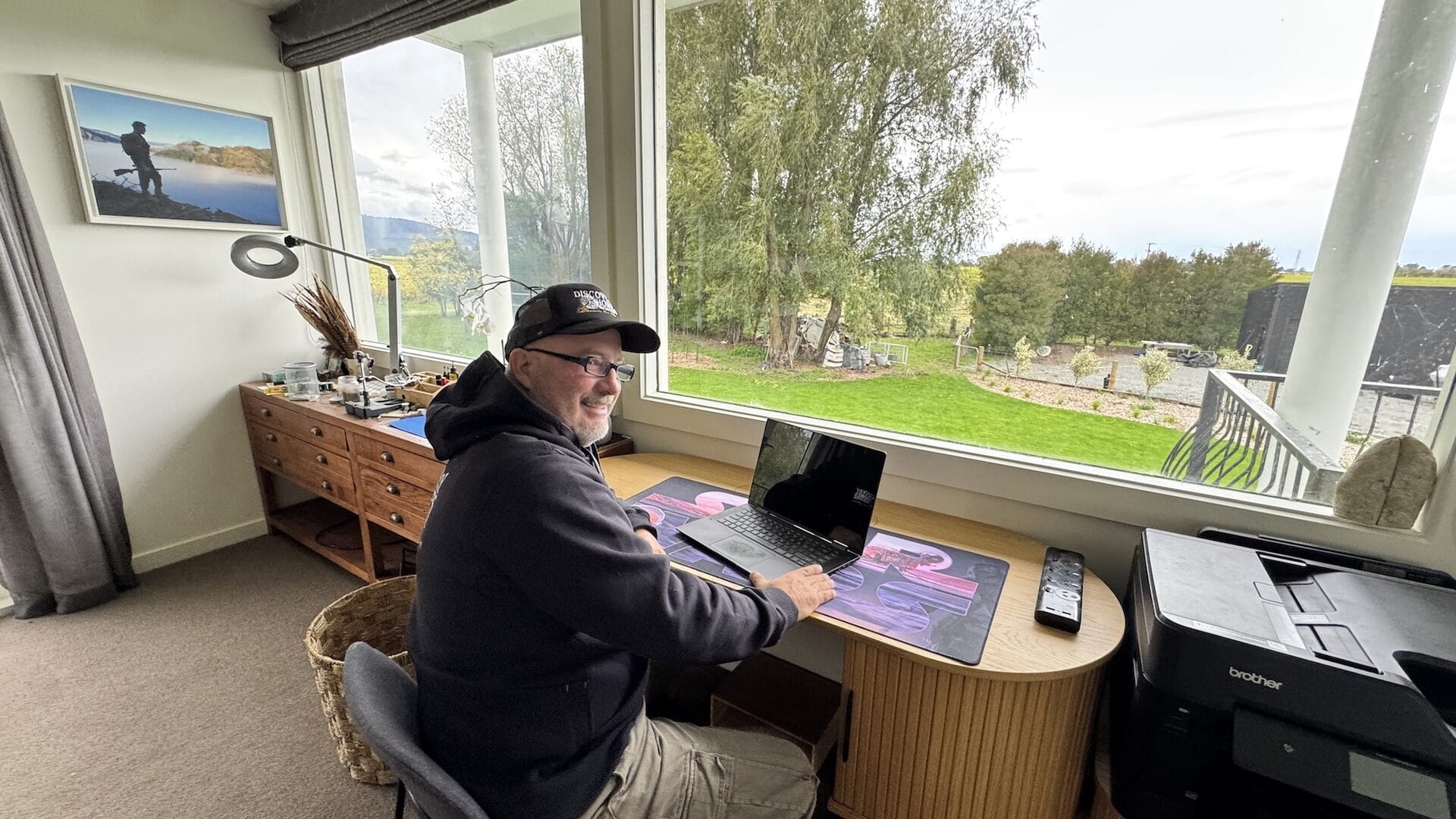 Ben Grady at his desk reviewing plans during a Discovery Session