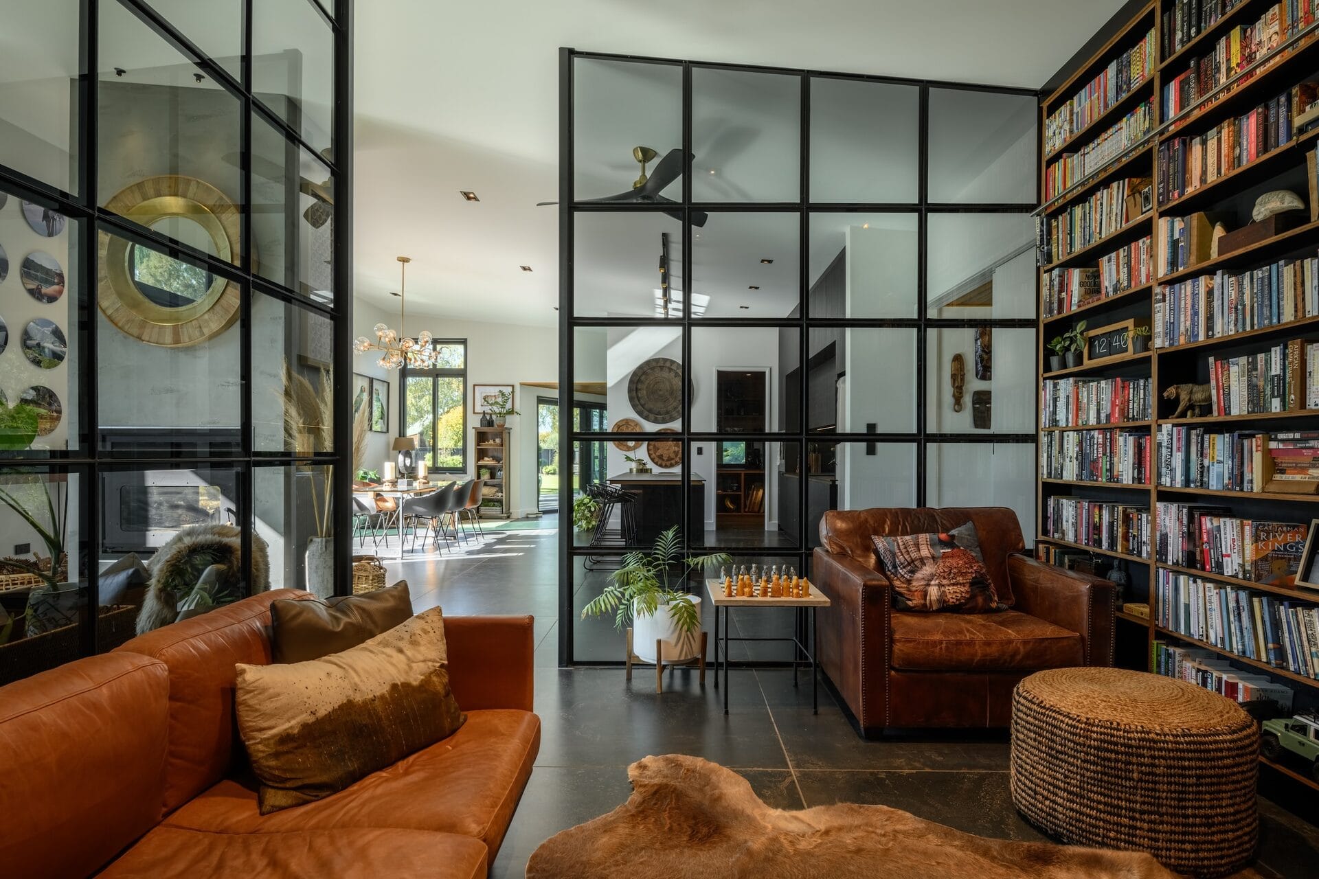 Grady Home — bespoke full-height steel and glass library wall