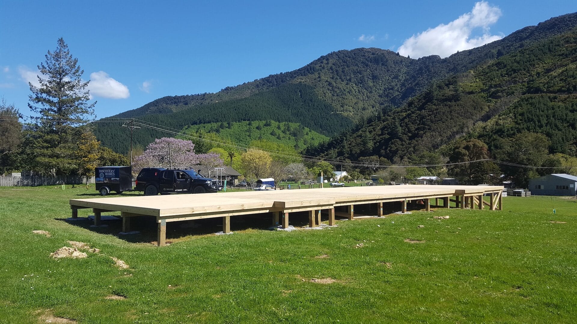 Gregory Home — timber pile foundation set against the Wakamarina Valley