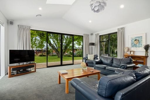Olliver Home — living room with scissor trusses