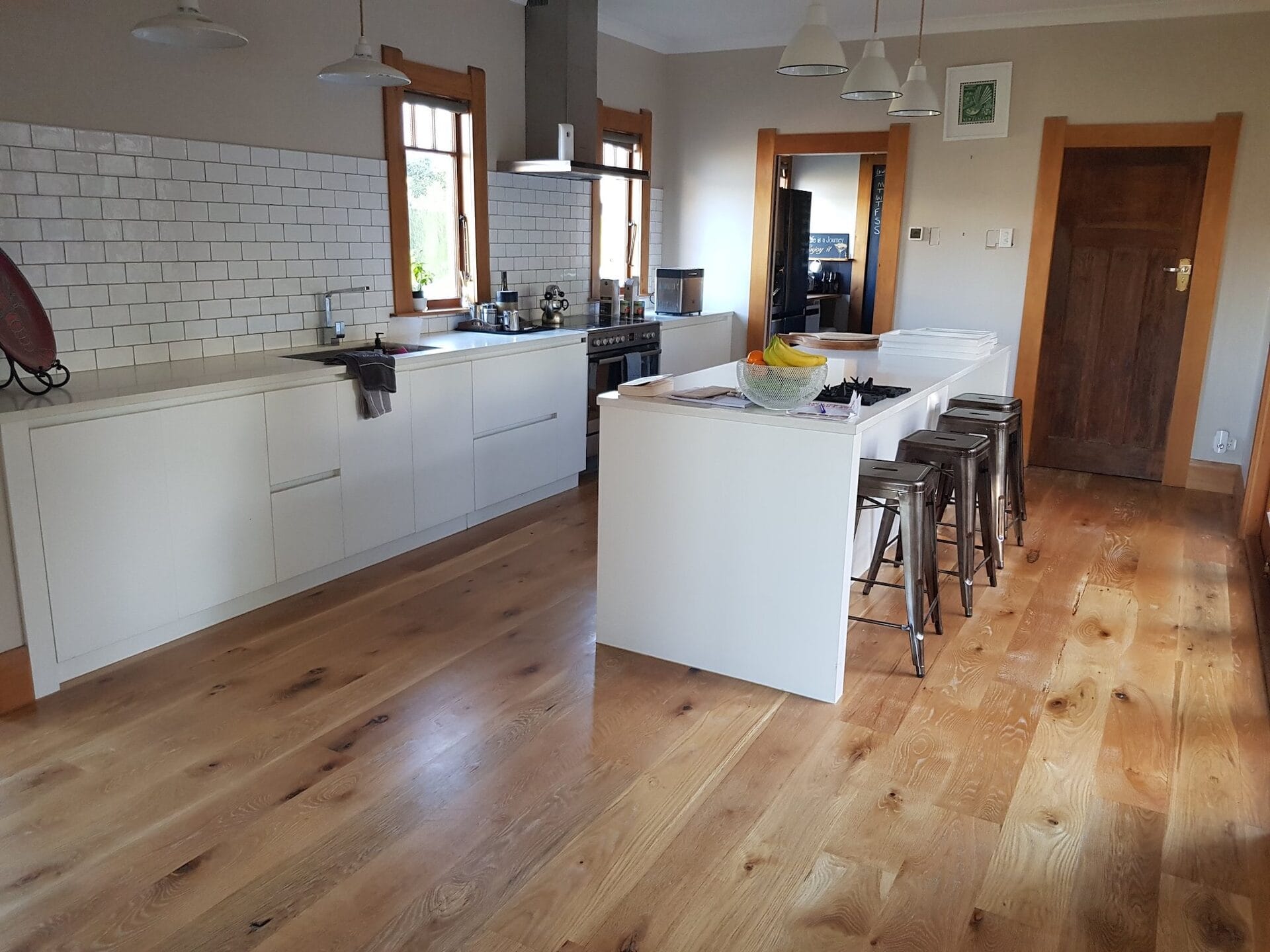 Severne St — open plan kitchen with American Oak flooring and pendant lighting