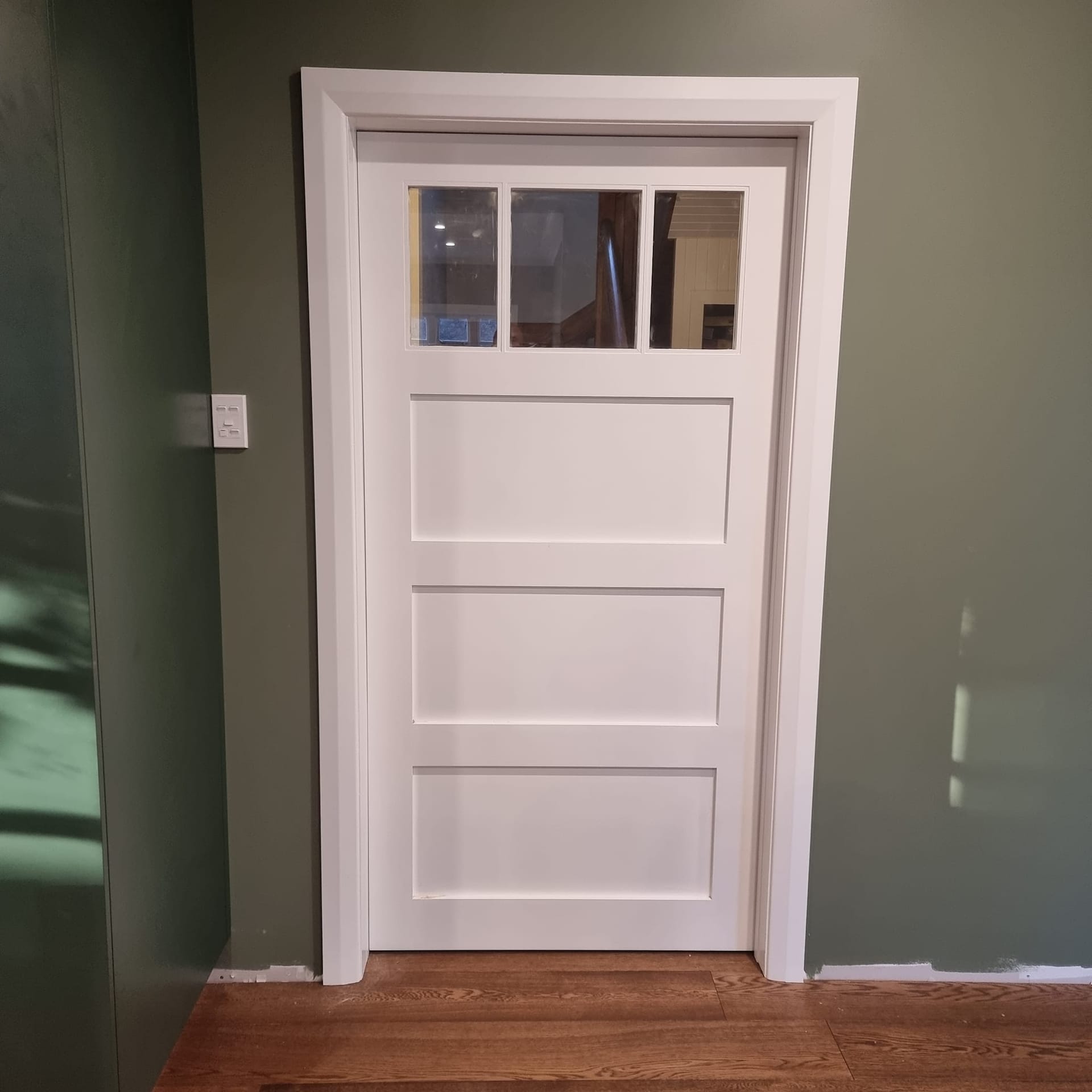 Smalls — interior door with glazed top panels, in keeping with the existing home
