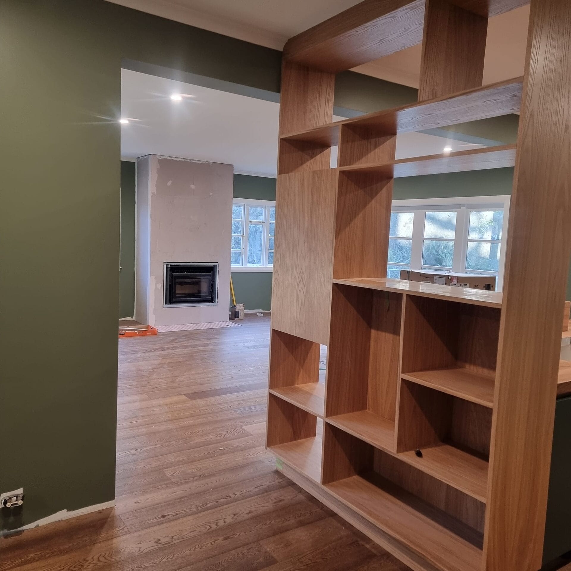 Smalls — new lounge addition with fireplace, viewed from the kitchen